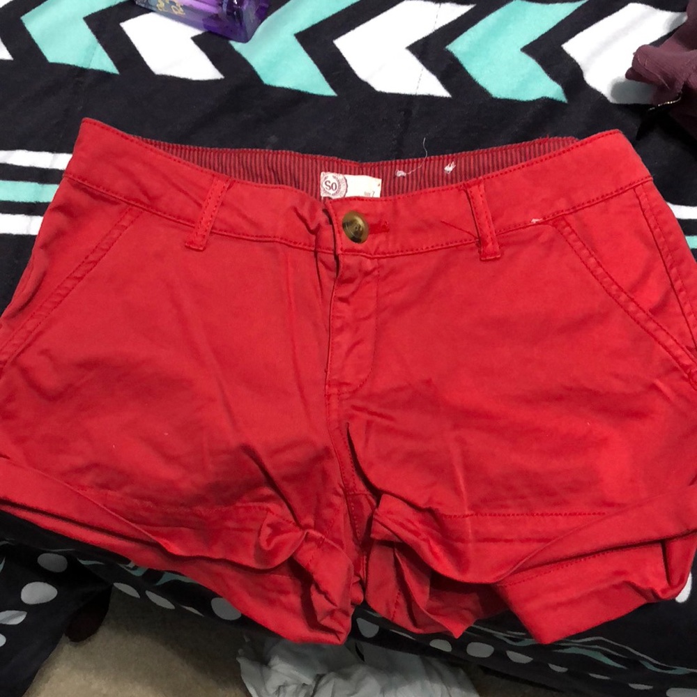 red shorts